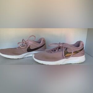 Purplish-Pink Nike Tennis Shoes